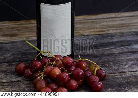 Chilled Wine Bottle With Blank Label With Fruits On The Side