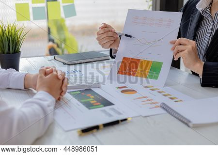 Atmosphere Brainstorming Session Of A Startup Company, Two Founders Of The Company Attended A Meetin