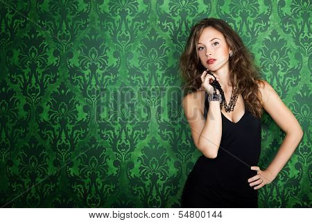 Beautiful Gorgeous Model Posing In Green Vintage Room