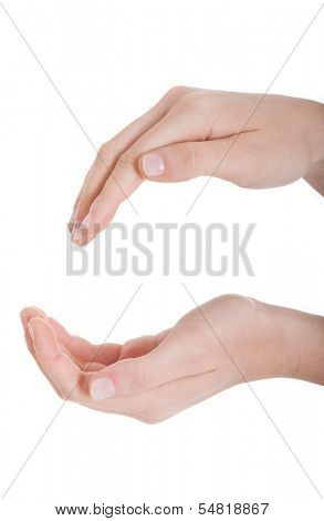 Female's hands in a roung shape. Isolated on white. 