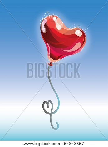 Red heart ballon in the blue sky