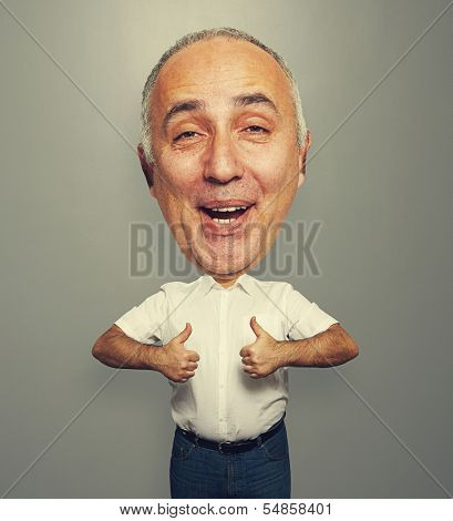 bighead funny laughing man showing thumbs up over grey background