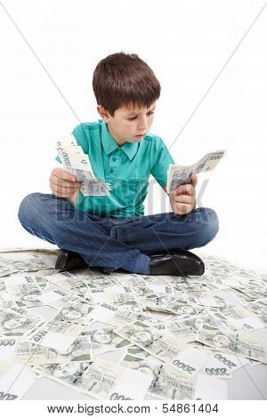 Boy Sitting On Money, Money Concept
