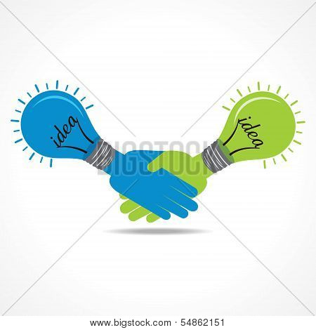 Businessman handshake background with bulb
