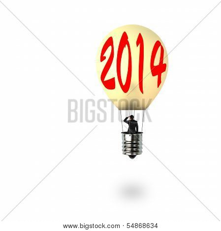 Man Taking Glowing Lamp Balloon With 2014 Word On It