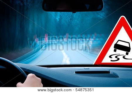 night driving - caution, curvy road