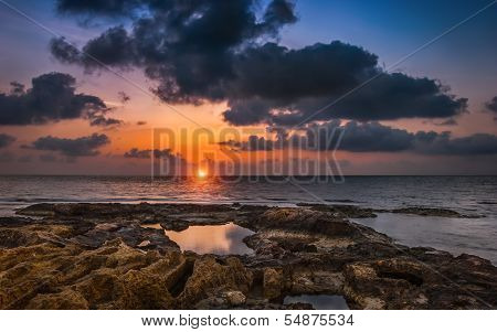 Sunset Over The Sea