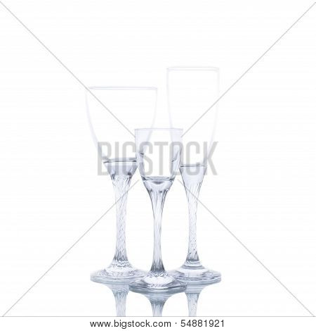 Three empty glasses of wine isolated on white