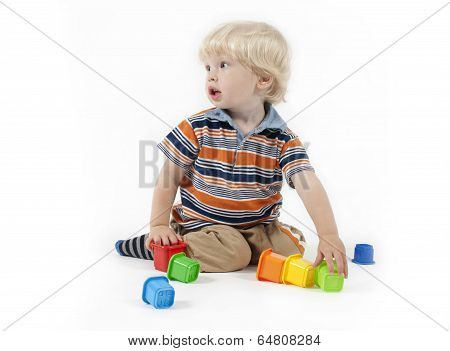 Child plays educational toy