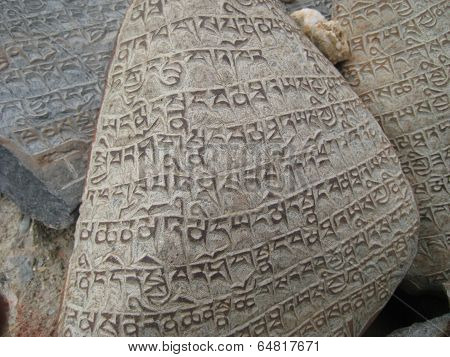 stone carved with symbols of prosperity_12