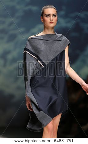ZAGREB, CROATIA - MAY 09: Fashion model wearing clothes designed by Iva Karacic on the Zagreb Fashion Week on May 09, 2014 in Zagreb, Croatia.