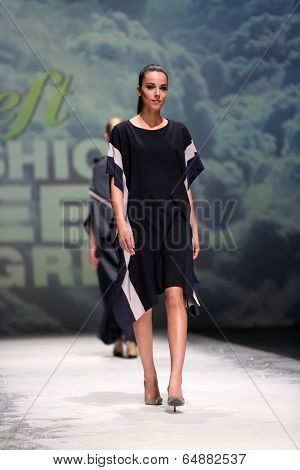 ZAGREB, CROATIA - MAY 09: Fashion model wearing clothes designed by Iva Karacic on the Zagreb Fashion Week on May 09, 2014 in Zagreb, Croatia.