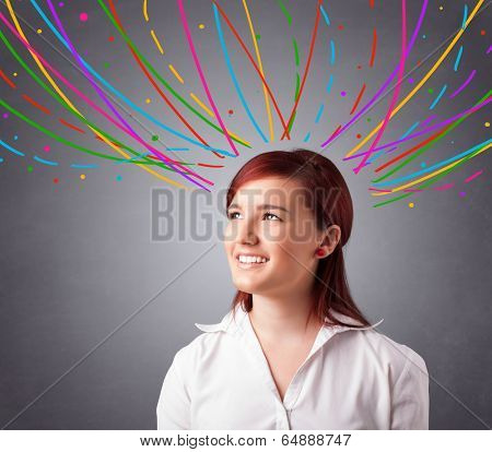 Pretty young girl thinking with colorful abstract lines overhead