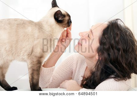 Woman  Having Good Times At Home With Cat