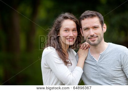Portrait Of A Young Happy Couple In The Nature