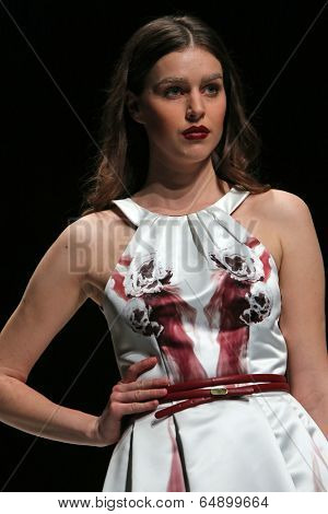 ZAGREB, CROATIA - MAY 09: Fashion model wearing clothes designed by Avaro Figlio on the Zagreb Fashion Week on May 09, 2014 in Zagreb, Croatia.