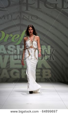 ZAGREB, CROATIA - MAY 09: Fashion model wearing clothes designed by Avaro Figlio on the Zagreb Fashion Week on May 09, 2014 in Zagreb, Croatia.