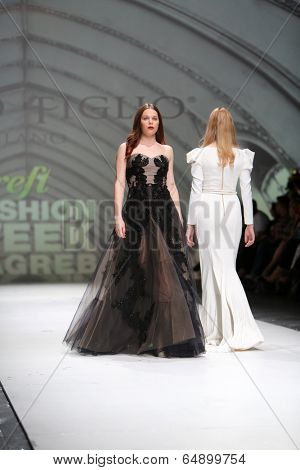 ZAGREB, CROATIA - MAY 09: Fashion model wearing clothes designed by Avaro Figlio on the Zagreb Fashion Week on May 09, 2014 in Zagreb, Croatia.