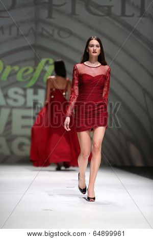 ZAGREB, CROATIA - MAY 09: Fashion model wearing clothes designed by Avaro Figlio on the Zagreb Fashion Week on May 09, 2014 in Zagreb, Croatia.