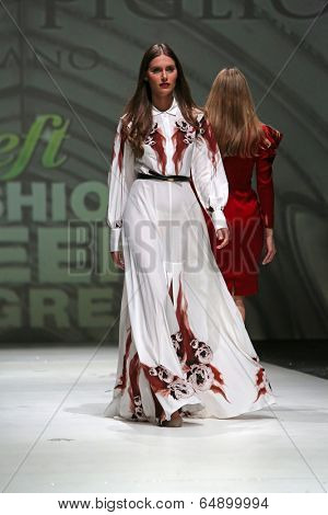 ZAGREB, CROATIA - MAY 09: Fashion model wearing clothes designed by Avaro Figlio on the Zagreb Fashion Week on May 09, 2014 in Zagreb, Croatia.