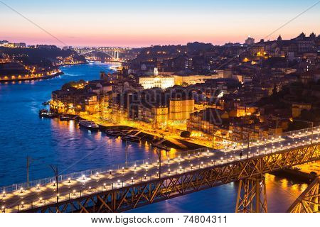 Porto Cityscape Portugal at dusk with Dom Luiz bridge