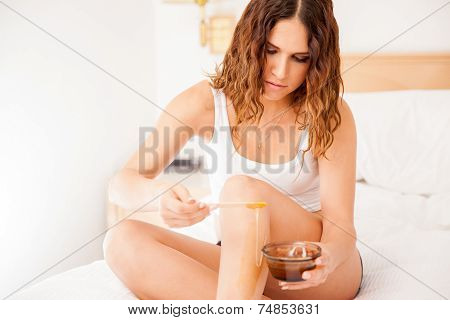 Removing Hair From Her Legs