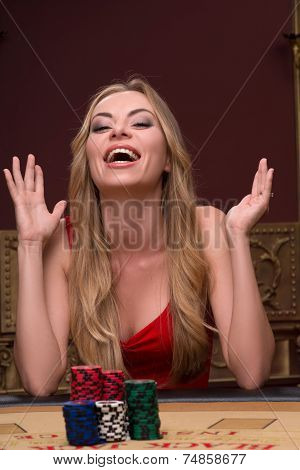 Handsome man and beautiful woman in casino