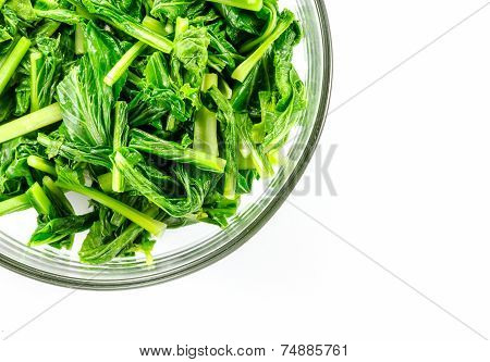 Vegetables Green Kale Are Pieces In A Bowl With Empty Space On The Right