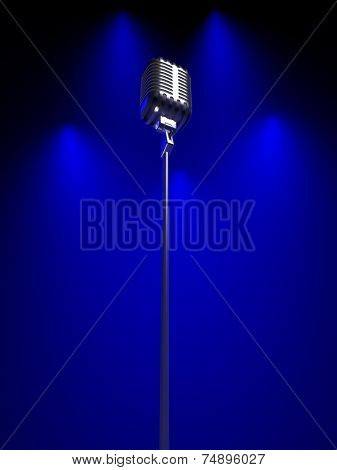 Old fashioned microphone under blue spot lit background