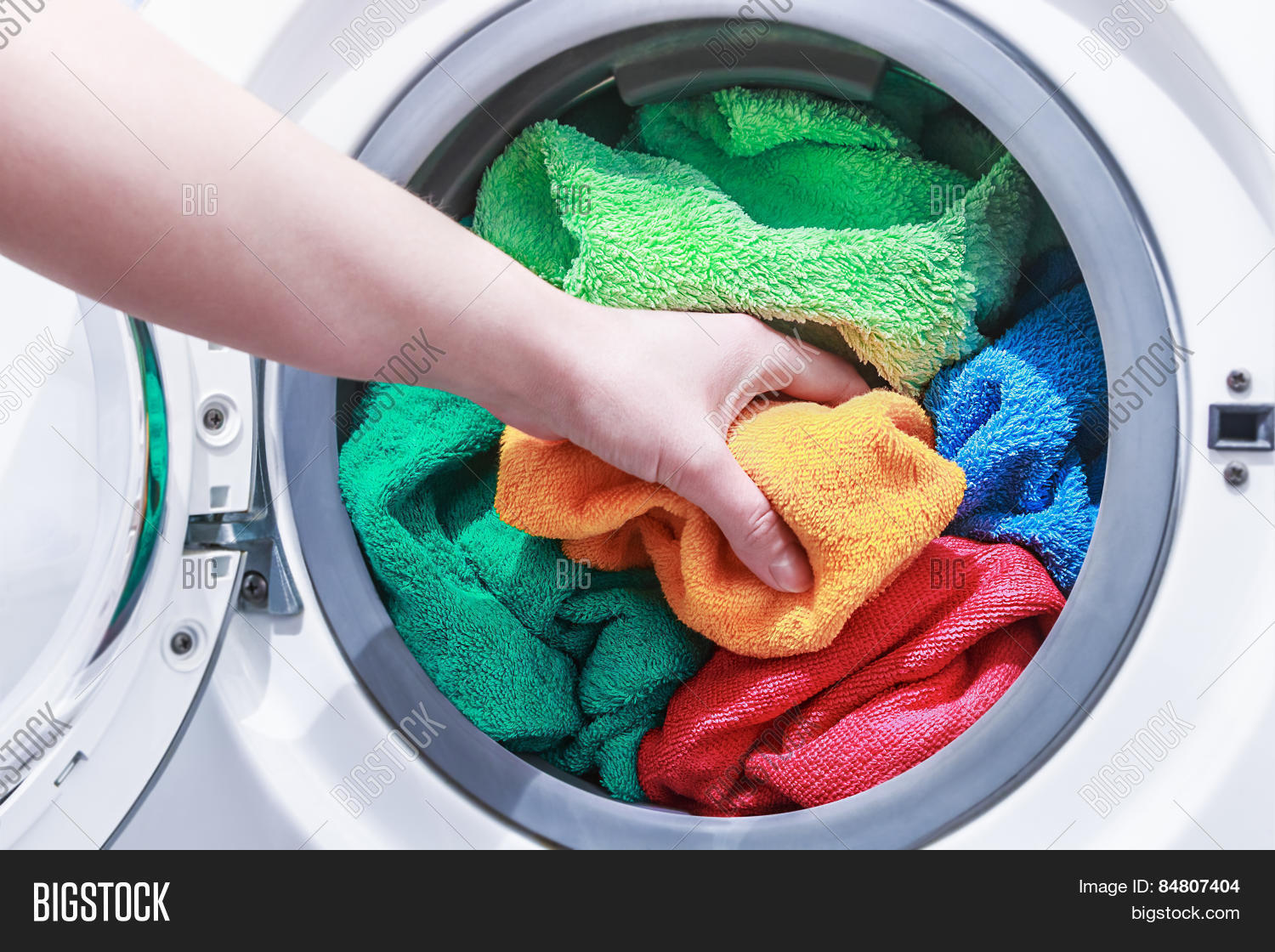 Hand Puts Laundry Into Image & Photo (Free Trial) Bigstock