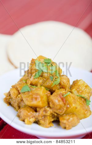Bombay potatoes in a rich aromatic curry sauce