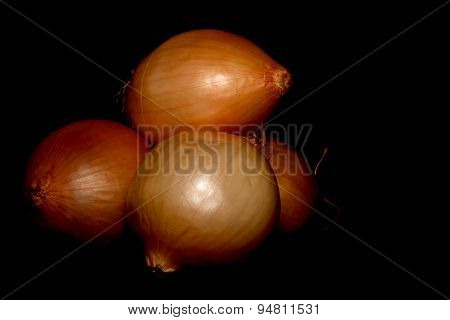 Onions Isolated On Black Background
