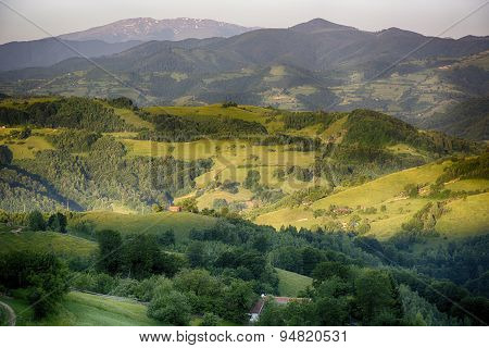 Pale of light. Morning on mountain hills. Holbav