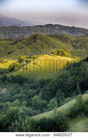 Pale of light. Morning on mountain hills. Holbav