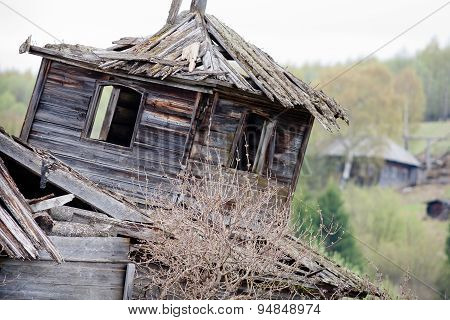 The Ruins Of A Wooden House