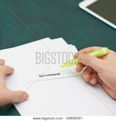 Marking words in an investment definition
