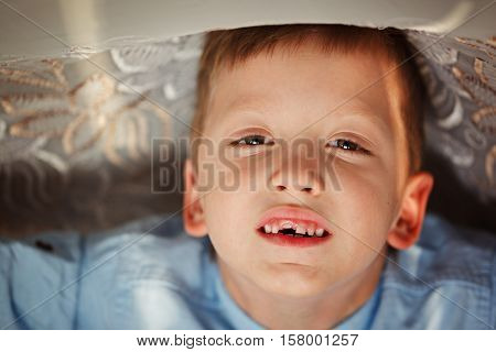 The child dropped the first milk tooth
