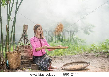 Beautiful Thai Asian Women Winnow Rice Separate Between Rice And Rice Chaff Identity . In Traditiona