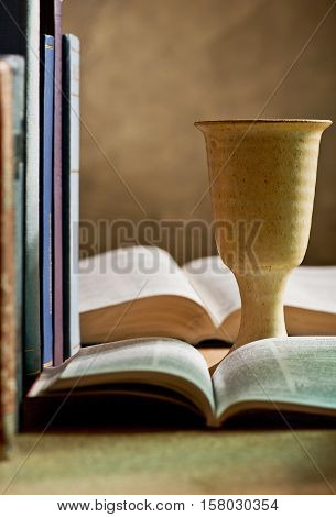 still life with chalice of wine and bible