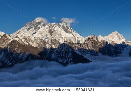 Mount Everest View From Renjo La Pass. Himalayas Mountain Valley Covered With Curly Clouds. Dramatic