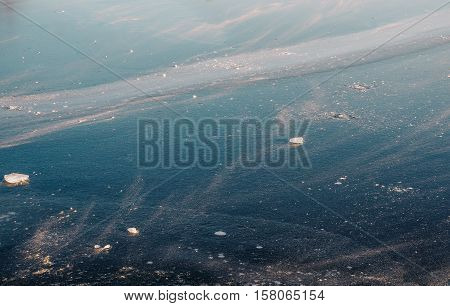 Ice on lake, Ice on water. Texture, background. Free copyspace