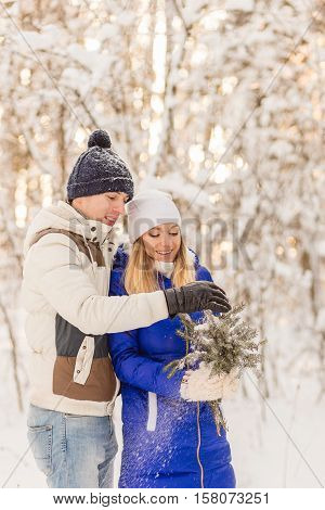 The Guy And The Girl Have A Rest In The Winter Woods.