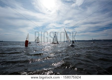 Kiev, Ukraine - September 30, 2016: Sailing yacht training day. Day before race on the Kiev reservoir or pond