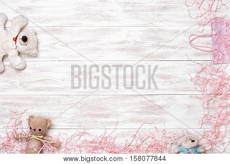 Frame for valentine's day, Birthday, Mother's Day, New Year, Christmas Day. Top view with copy space. Photos for posts, blogs, advertising and news. White wooden background with frame. Greeting concept card