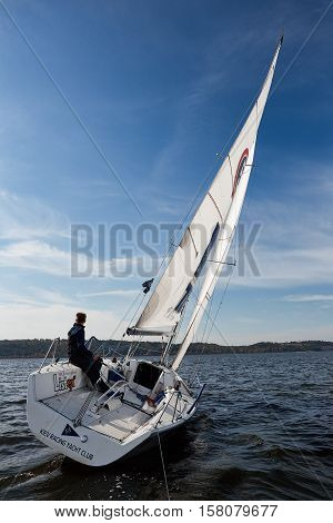 Kiev, Ukraine - September 30, 2016: Sailing yacht training day. Day before race on the Kiev reservoir or pond
