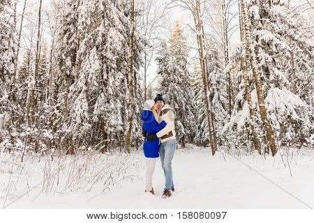 The Guy And The Girl Have A Rest In The Winter Woods.