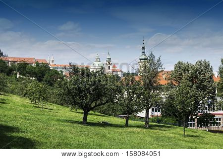Petrin Hill park in Prague. View on the St. Nicholas Church