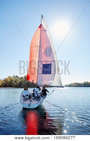 Kiev, Ukraine - September 30, 2016: Sailing yacht training day. Day before race on the Kiev reservoir or pond