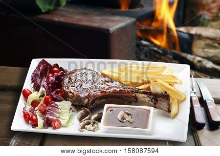 Prime rib with fries and salad