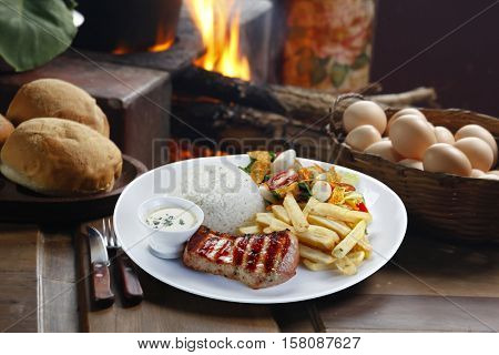 pork with rice and potatoes